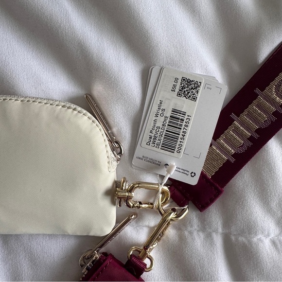 75&76 Lululemon Dual Pouch Wristlet Wordmark - Deep Luxe Gold Bone - Picture 7 of 7
